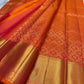 Sunset orange vermillion Kancheepuram saree, vermilion orange border with floral vine motifs detail