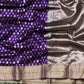 Detail of imperial-purple Chanderi silk with silver buttas