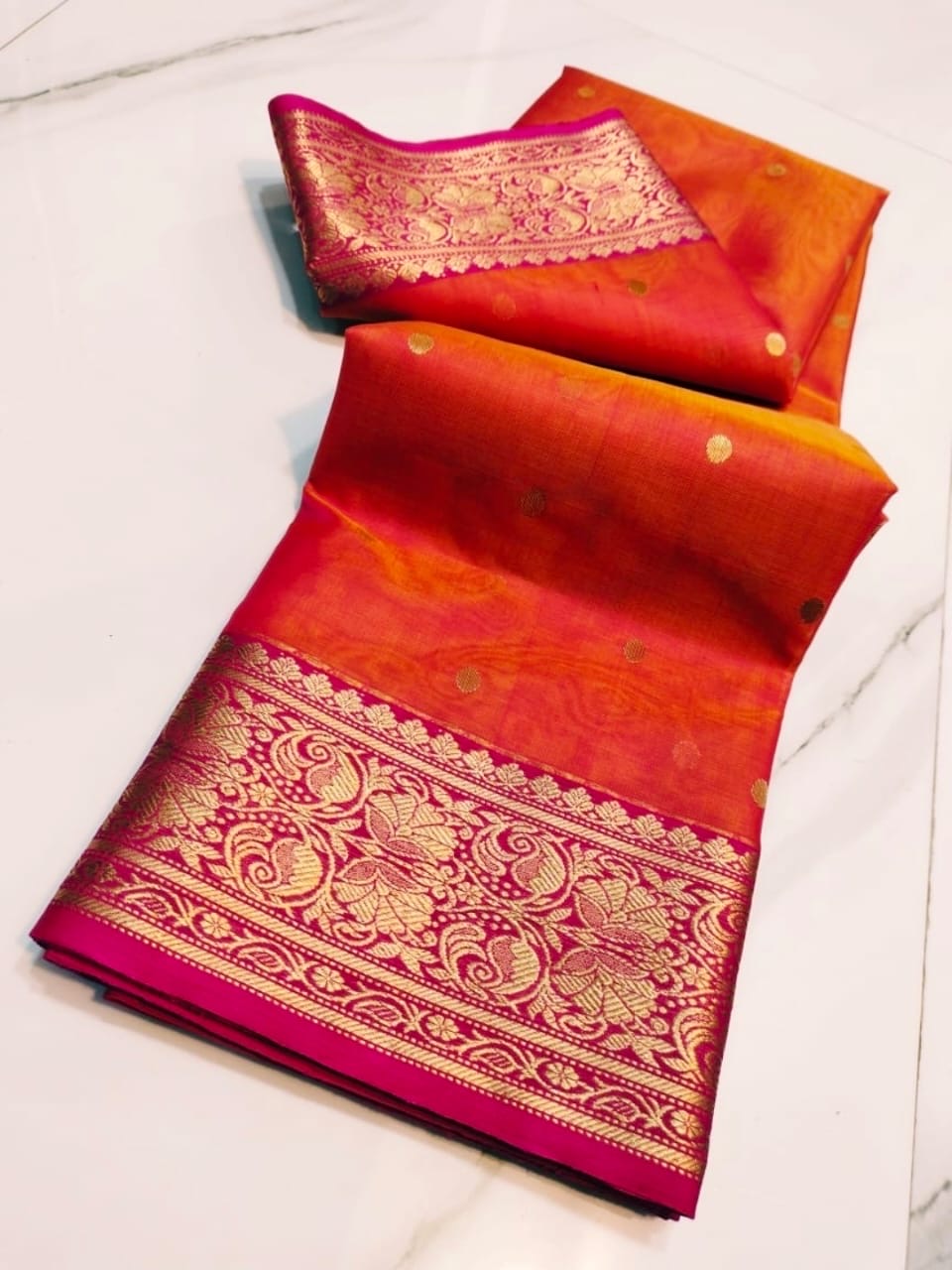Handwoven tangerine orange and rani pink Katan silk Chanderi saree, draped view