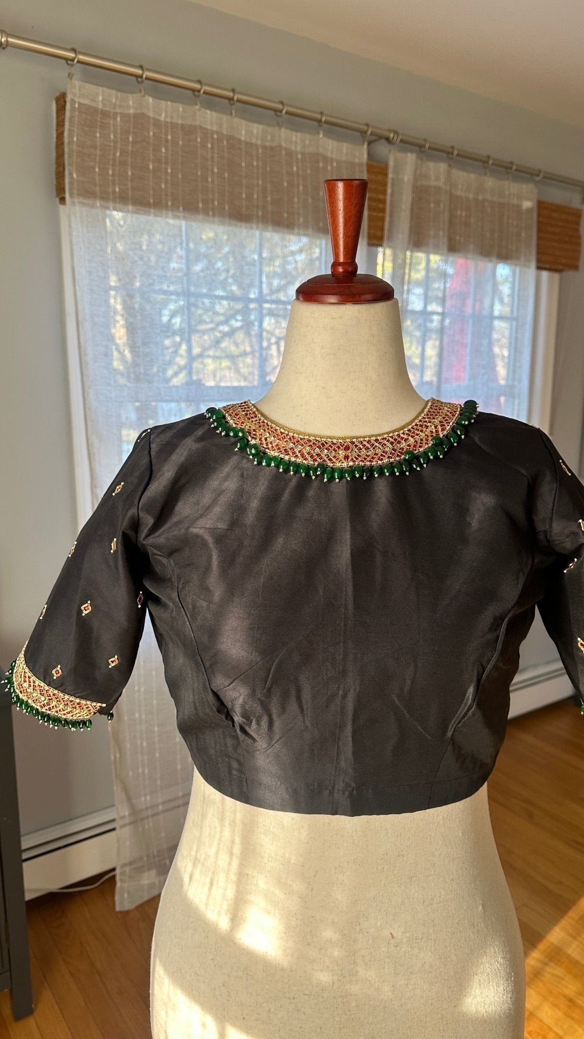 Black silk cotton Tanjore designer blouse with hand-set kemp stone embroidery inspired by temple jewelry