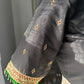 Close-up of durable kemp stones and hand embroidery on black silk cotton Tanjore blouse