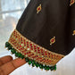 Made-to-measure black silk cotton Tanjore blouse designed as a statement jewelry piece