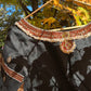 Front view of black silk Tanjore Treasure blouse featuring jewelry-inspired embroidery