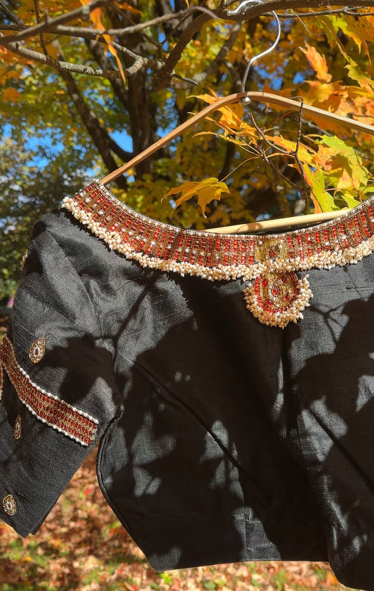 Front view of black silk Tanjore Treasure blouse featuring jewelry-inspired embroidery