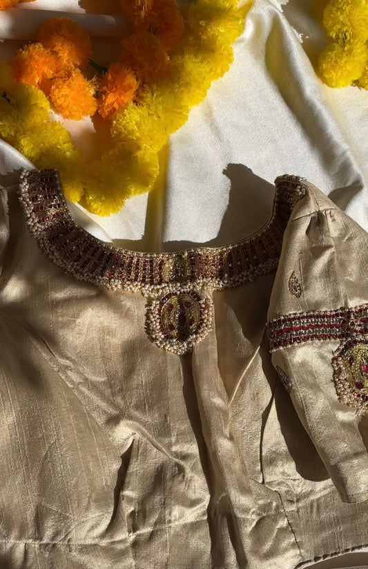 Gold silk Tanjore Treasure designer blouse with hand-set kemp stone embroidery