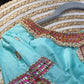 Made-to-measure pastel green silk Tanjore Treasure blouse designed as statement jewelry
