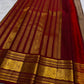 Fine zari kattam body in chandanam (sandalwood) tone with delicate woven buttas