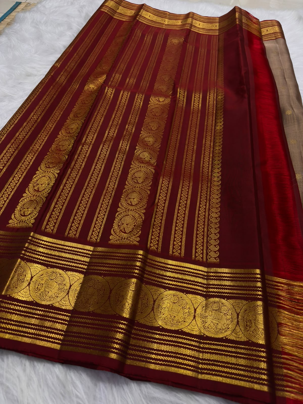 Fine zari kattam body in chandanam (sandalwood) tone with delicate woven buttas