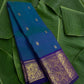 Teal and blue shot colour handwoven Kanchipuram pure silk saree with gandaberunda butta on banana leaf — Idam Living