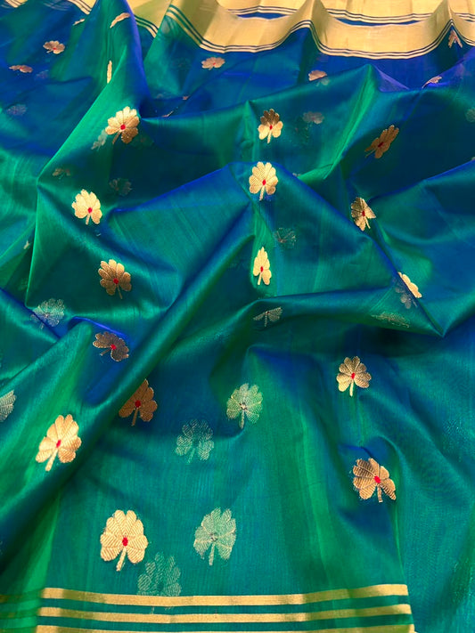 Deeper blue-toned pallu of peacock teal Katan Silk Chanderi saree with fine linear detail