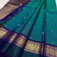 Neelam Blue Handwoven Pure Silk Kanchipuram Butta Saree with Teal Green Bird Motif Kaal Irangiya Gold Zari Border