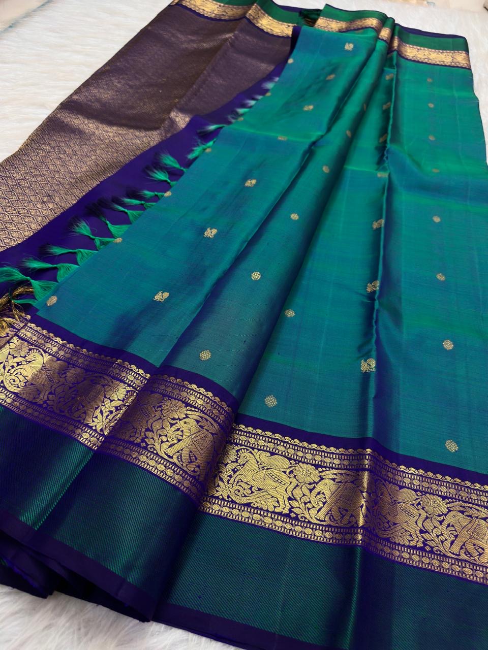 Neelam Blue Handwoven Pure Silk Kanchipuram Butta Saree with Teal Green Bird Motif Kaal Irangiya Gold Zari Border