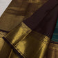 Deep teal Kanchipuram silk with chocolate brown and gold zari border