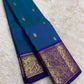 Close-up of gandaberunda double-headed bird butta in gold zari on teal Kanjeevaram silk saree — Idam Living
