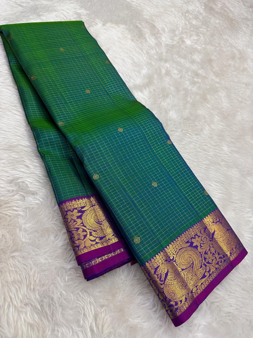 Full view of teal shot colour handwoven Kanchipuram pure silk saree with zari kattam and mayil border — Idam Living