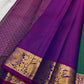 Large mayil peacock gold zari border close-up on teal shot colour Kanjipuram saree — Idam Living