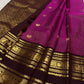 Paaku areca brown Varisaipet border with gold floral medallions, leafy scrolls and chevrons on a Vadamalli pink saree