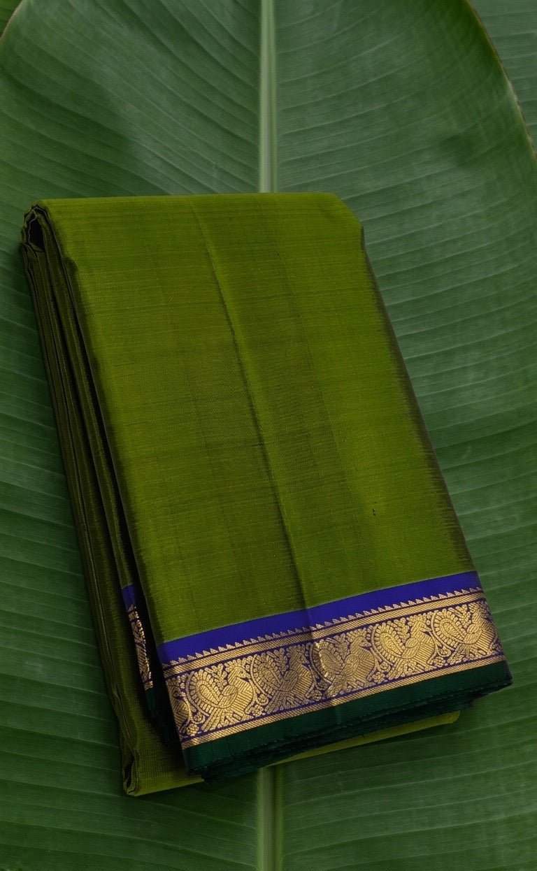 Temple olive green handwoven pure silk Kanjivaram saree with royal blue yaanai border – Idam Living