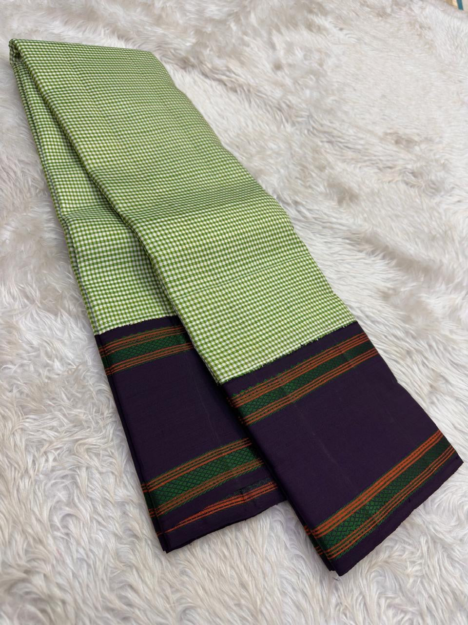 Tender Green and Deep Plum Handwoven Pure Silk Kanjivaram Saree with Kanchi Kattam Rettapet Border