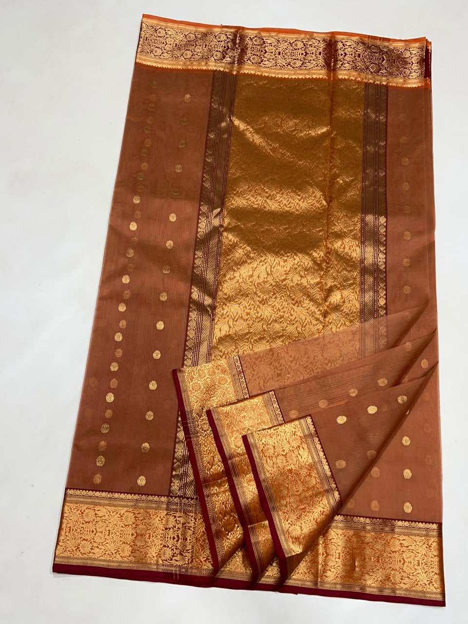 Burnished terracotta handloom Katan Silk Chanderi saree with gold floral border