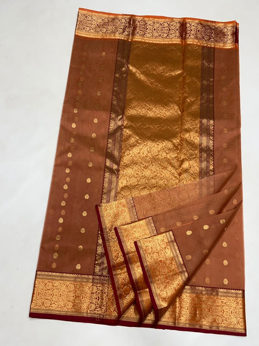 Burnished terracotta handloom Katan Silk Chanderi saree with gold floral border