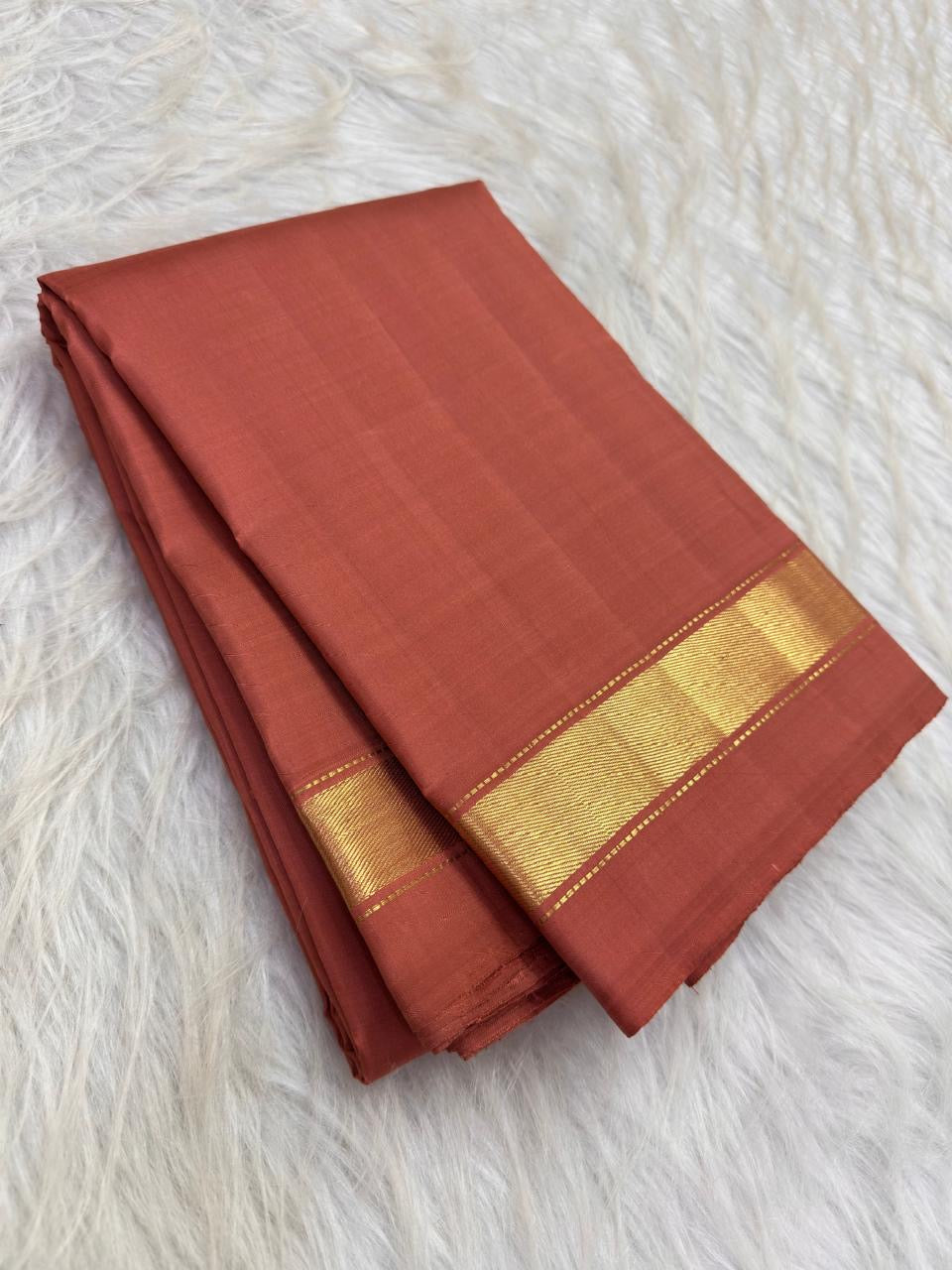 Terracotta lightweight Kanjipuram silk saree with gold zari border, full view