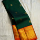 Thick Mayilkann gold zari border on Pure Silk Kanchipuram Korvai saree