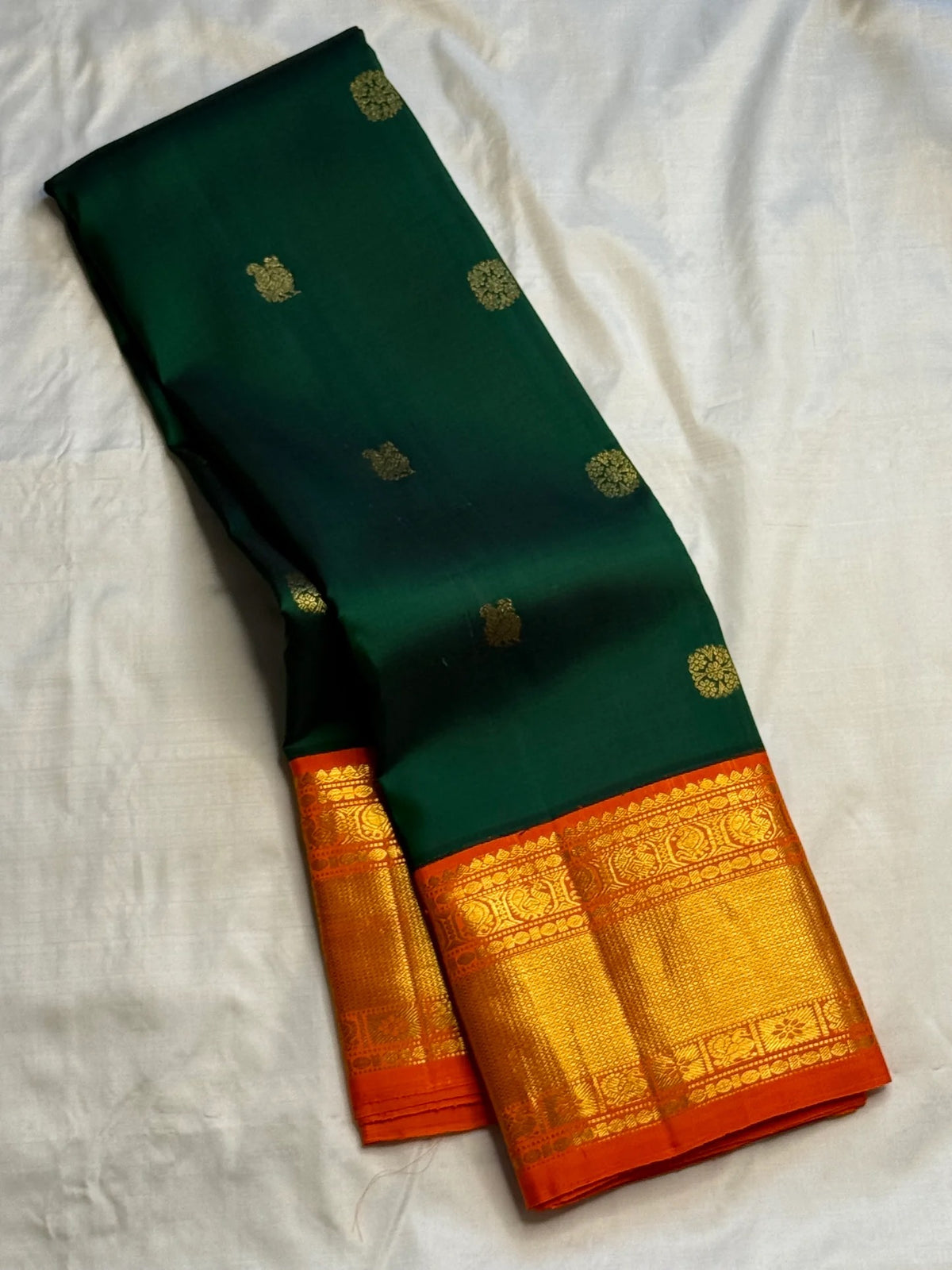 Thick Mayilkann gold zari border on Pure Silk Kanchipuram Korvai saree