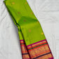 Bright Thulir Green Varisaipet Kanjeevaram with Mayil Chakram buttas and magenta-pink banded zari border