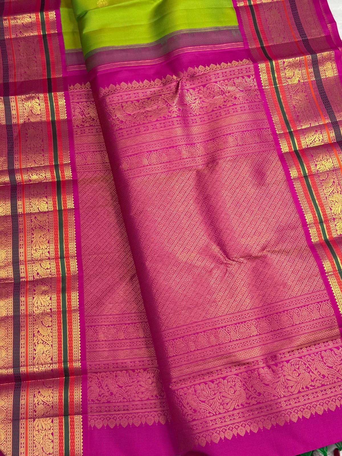 Thulir Pachai Green with Magenta Pink Kanchipuram silk saree with the body details of its Varisaipet design