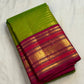 Layered Vanasringaram border with Vanki Pet zari work on a thulir pachai green Vairaoosi Kanchipuram saree.