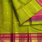 Handwoven thulir pachai green Pure Silk Kanchipuram Vairaoosi saree with jewel-toned pink border.