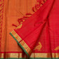 Bright vermilion red Kanchipuram silk saree showing closely spaced Vairaoosi zari lines and gold Kili parrots