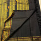 Deepest Kanchana black Kanjivaram silk saree with traditional gold zari and woven motifs.