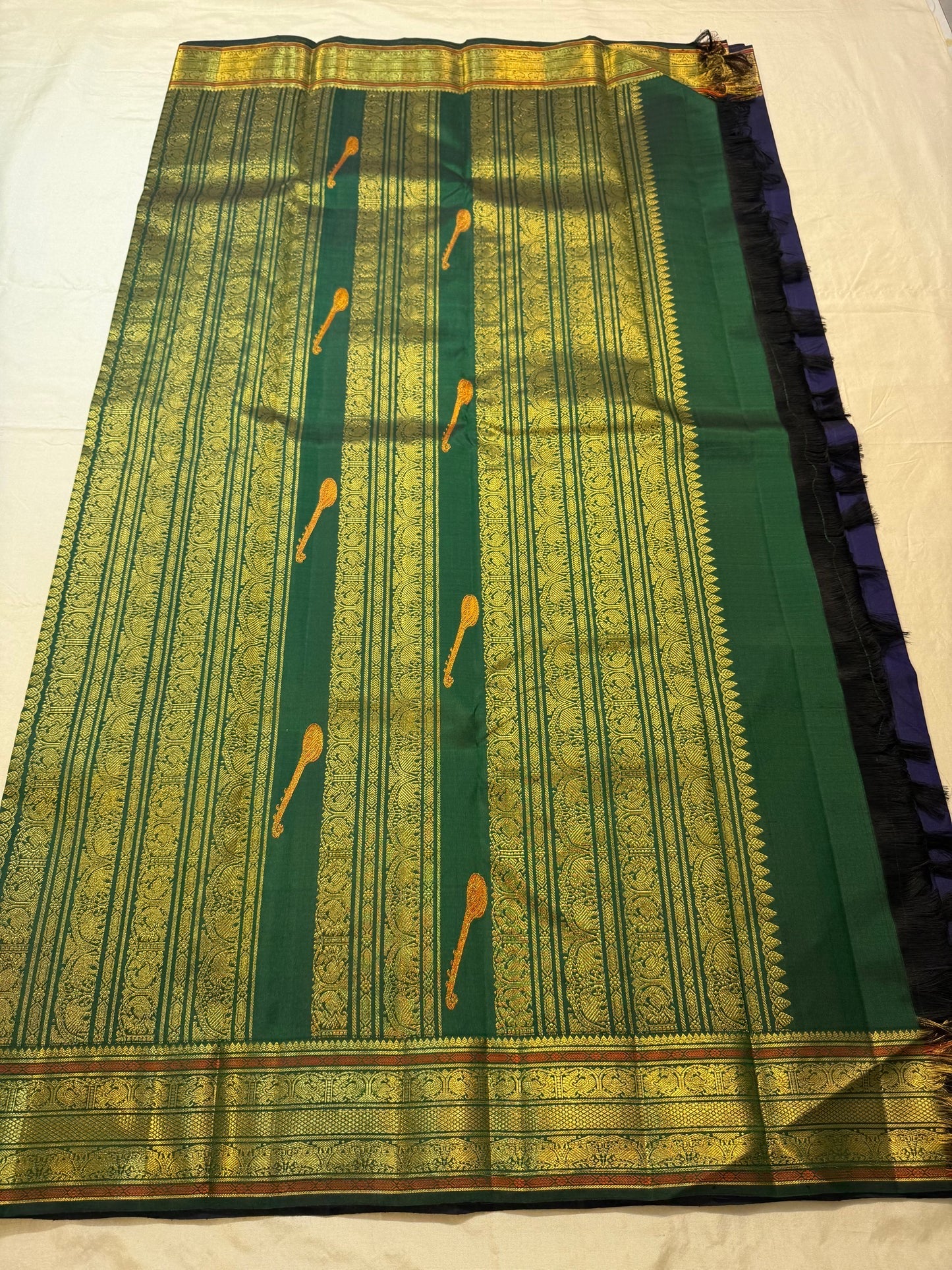 Folded view of midnight navy and bottle green butta Kanjipuram silk saree — Idam Living