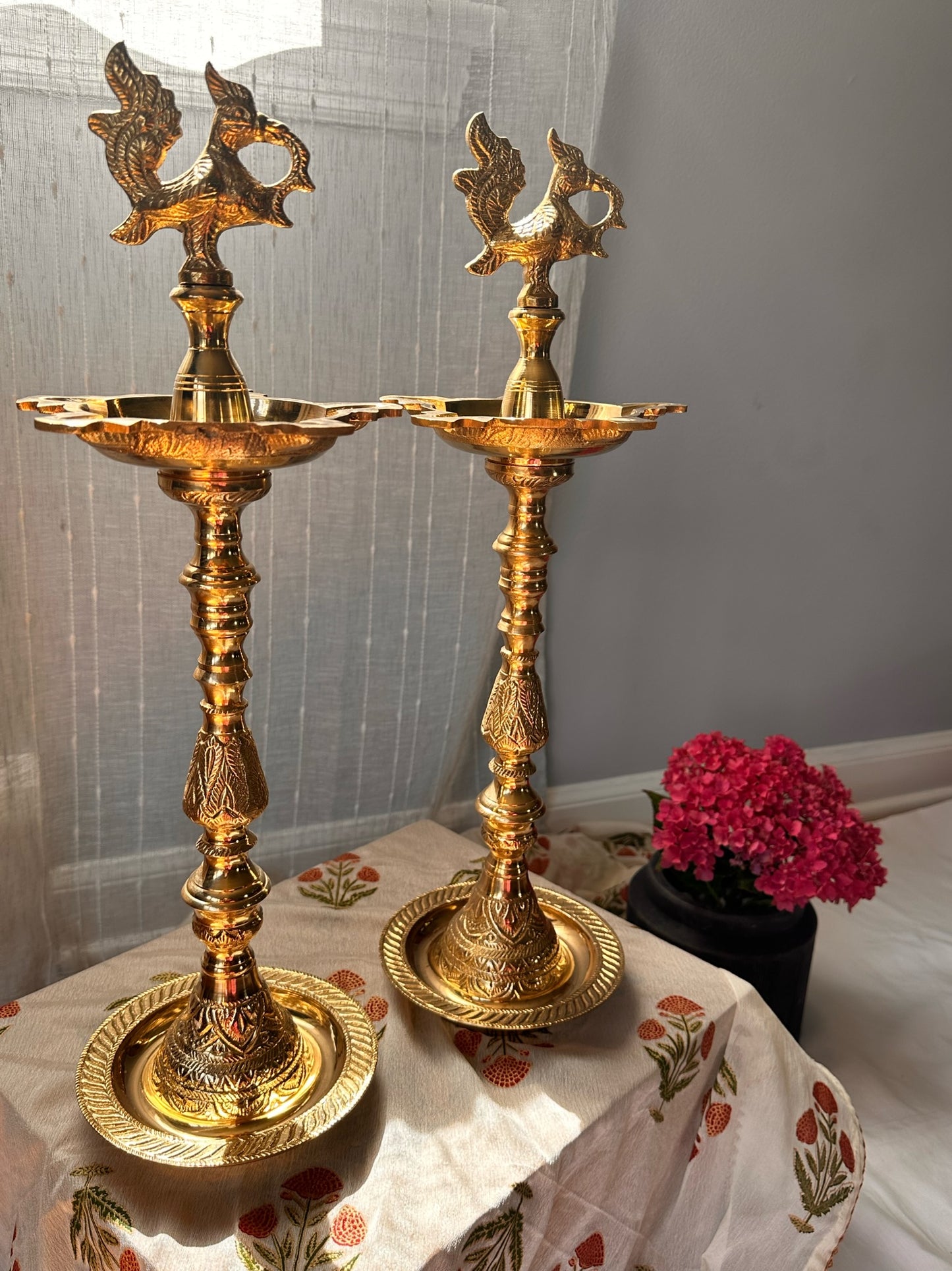 Traditional brass Kuthu Vilakku lamps handcrafted in Nachiyar Kovil temple style