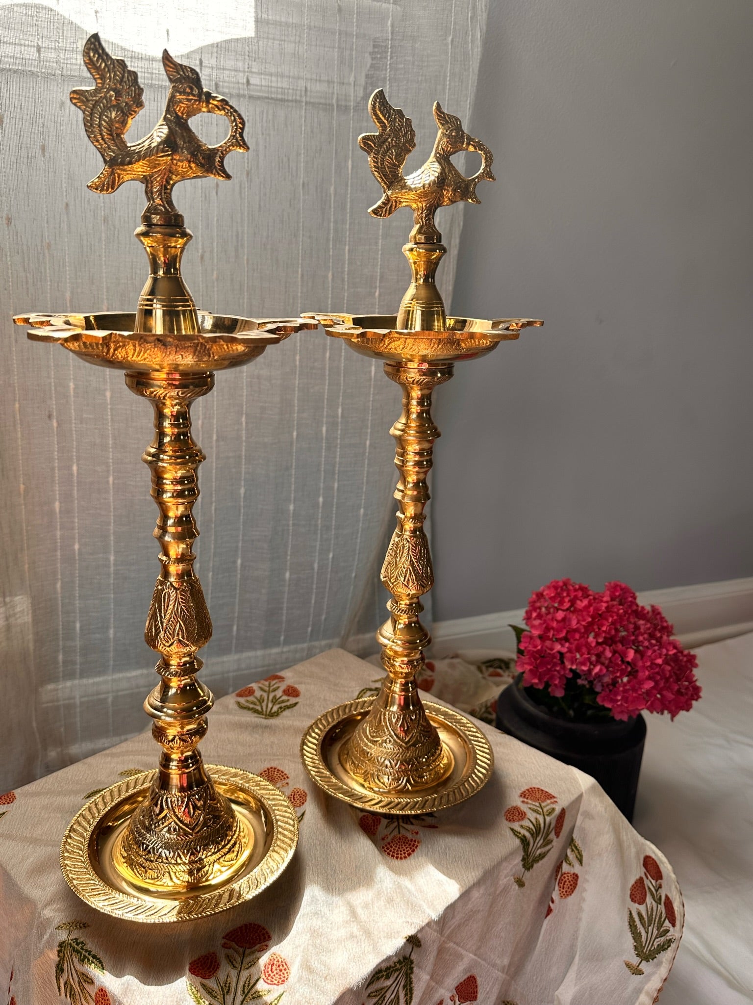 Traditional brass Kuthu Vilakku lamps handcrafted in Nachiyar Kovil temple style