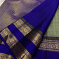 Traditional Gandaberunda motif detail on the sage green Kanchipuram silk saree.