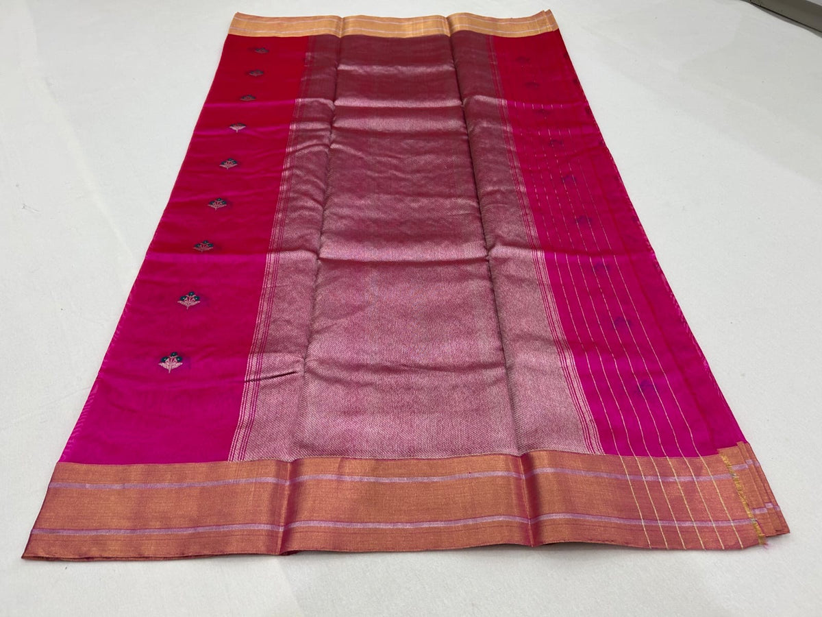 Rani pink Chanderi Pattu silk saree showing the shimmering metallic-toned pallu and gold border