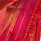 Traditional Ettukol Kanjivaram saree with warm pink and orange colour combination.