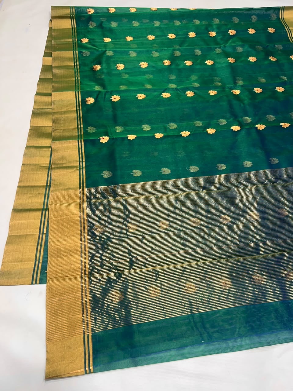 Traditional gold floral Katan Silk Chanderi saree in peacock blue-green