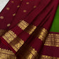 Traditional green Kanchi silk saree with deep ruby rettapet border and gold zari Idam Living