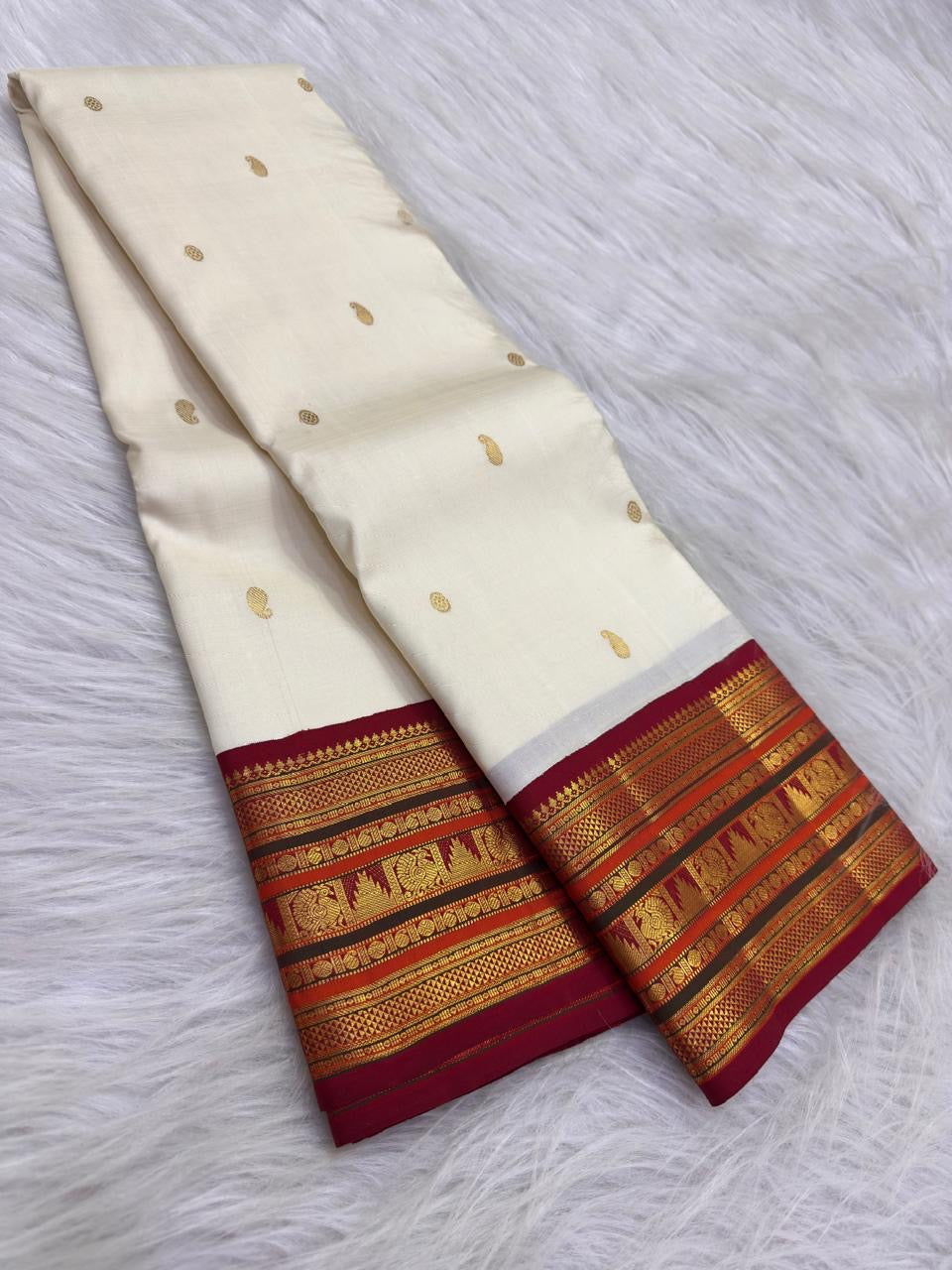 Handwoven soft warm ivory Varisaipet pure silk Kanchipuram saree with rich zari border