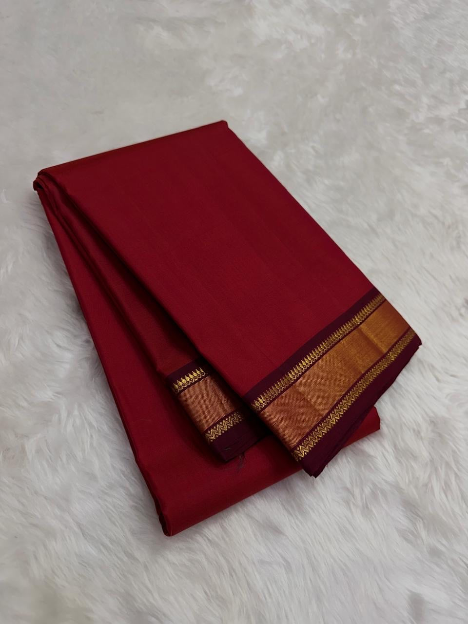 Brick Red and Deep Arakku Maroon lightweight Kanchipuram silk saree, broad gold zari border and striped maroon pallu; full layout