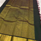 Berry-red and ivory checked silk body with deep forest-green gold border | Kanchipuram pure silk saree.