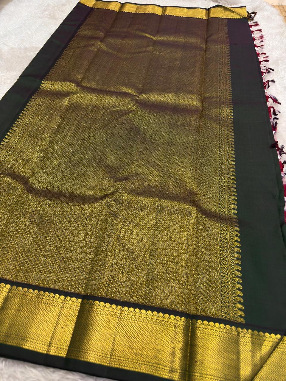 Berry-red and ivory checked silk body with deep forest-green gold border | Kanchipuram pure silk saree.