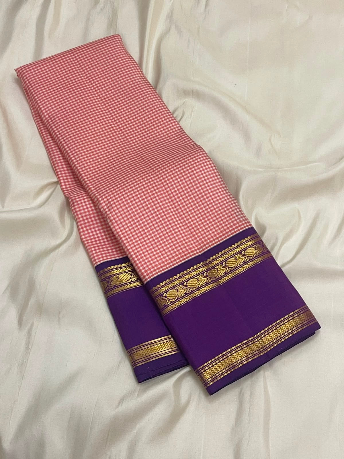 Full drape of the rose pink Kanchi Pattu saree showing the traditional Kanchi Kattam weave — Idam Living.