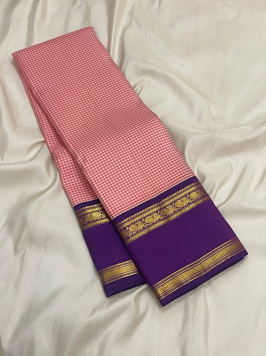 Full drape of the rose pink Kanchi Pattu saree showing the traditional Kanchi Kattam weave — Idam Living.