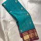 Peacock Teal KanchiPattu saree – grand pallu with elephant zari buttas — Idam Living