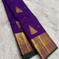 Pure Kanjivaram silk saree in imperial violet with forest green selvedge and gold zari